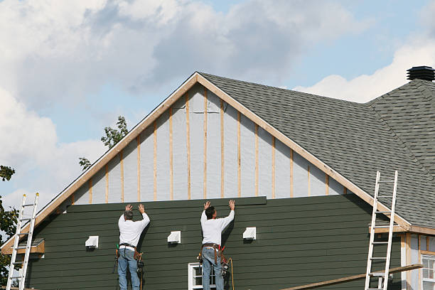 Professional Siding Replacement technician working in Troy, OH
